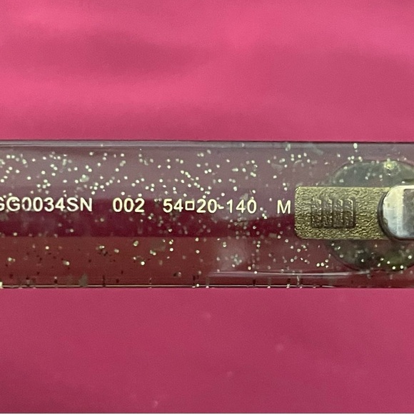 Gucci authentic Black Women's Sunglasses with Gold interlocking G accents. - Picture 6 of 12